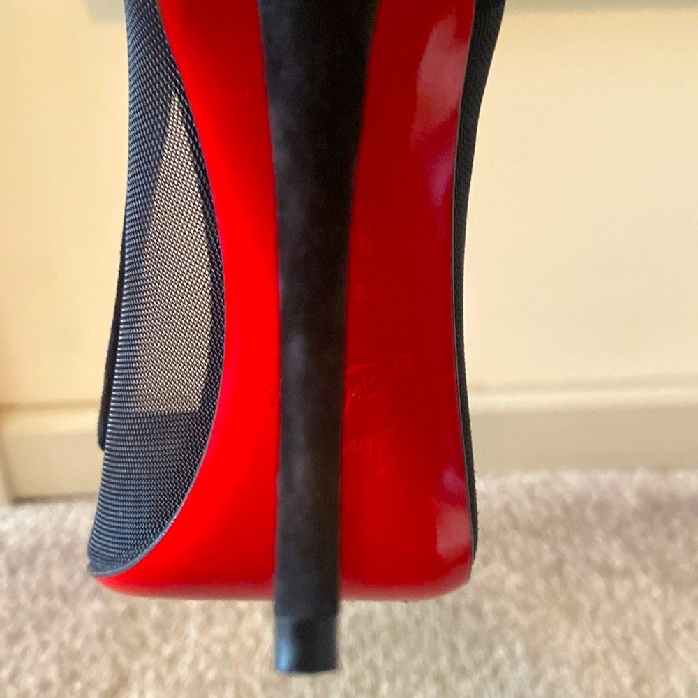 Christian Louboutin black suede worn once too tight heel is perfect.